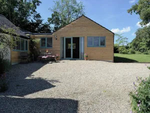 Image of This tastefully renovated former barn sits in one acres of grounds just outside a small village.
