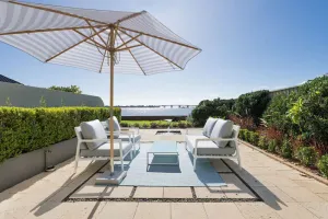 Image of King Bedroom Waterfront Courtyard Apartment
