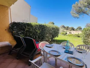Image of Cozy 4-Person Ground Floor Apartment with Terrace, Near Sant'Ambroggio Beach