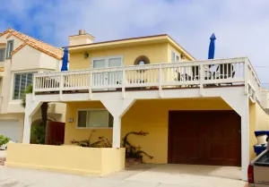 Image of See and hear the ocean from this beautiful beach house steps from the beach.