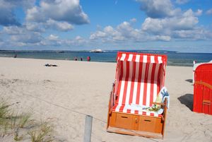 Image of bright penthouse with 3 sun terraces, private beach chair on the beach