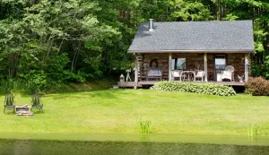 Image of Charming Log Cabin on Private Pond Nestled in Woods Near Holiday Valley Resort