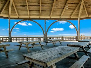 Image of Vibrant and Fun Beach House with Stock Tank Pool By Southern Belle Tybee