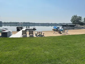 Image of Lakefront Family Friendly Home with Large Sandy Beach and Beautiful Views