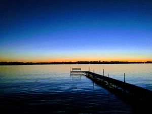 Image of Hamptons style Lake house on Sunset point. With water on both the east and west!