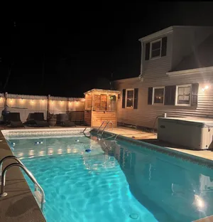 Image of Lovely Westerly home w\/ In-Ground Salt Water Pool, Hot Tub, and Game Room!