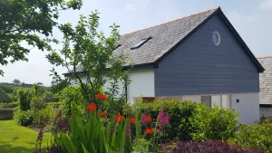 Image of A luxurious, bright spacious home in a village location, 5 mins to the beach.