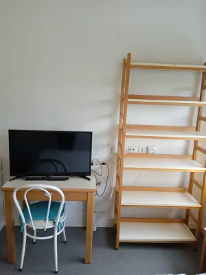 Image of Lovely furnished studio: parking, washing machine, TV, high-speed internet near all amenities.