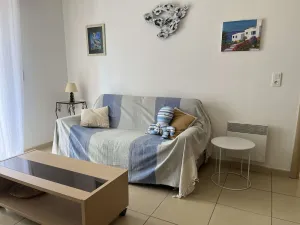 Image of Seaside Haven: Air-Conditioned 1BR with Terrace, Near Beach and Shops