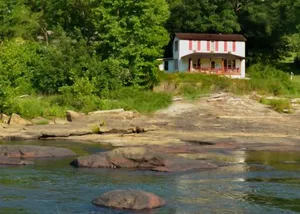 Image of Cozy Riverfront Mountain Home in West Virginia. Pet\/Family Friendly. Sleeps 10.