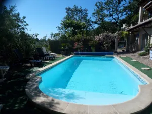 Image of Pleasant house in the middle of oaks with swimming pool. At the foot of the Cévennes.