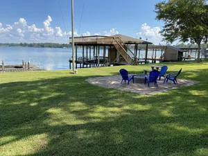 Image of Cozy Log Cabin - Lakefront 2 Boat Lifts 2 Jet Ski Lift FirePit 1Gig WiFi