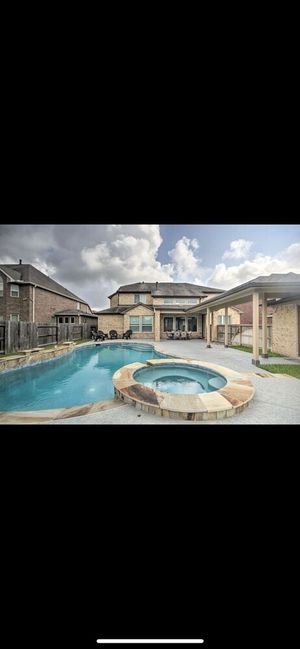 Image of \"Luxurious 3-Bedroom Mansion with Heavenly Heated Pool and Jacuzzi Retreat\"