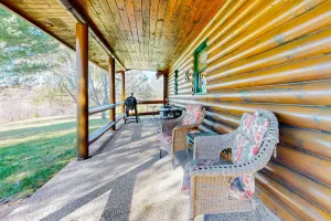 Image of Rustic dog-friendly cabin with fireplace, open layout, grill, W\/D, & firepit