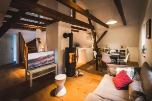 Image of Maisonette apartment on the top floor with fireplace on the edge of the forest
