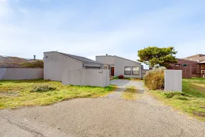 Image of Peaceful oceanfront home with private hot tub, pool access, & views from deck