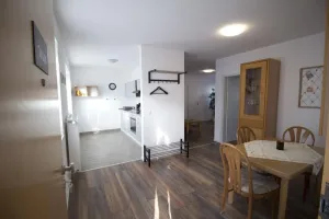 Image of The apartment offers a total of approx. 48 square meters of living space. A living room with laminate flooring, a complete kitchenette with refrigerator, a completely new chic bathroom. In the bedroom there is a bed (140x200m) with two bedside tables. Ver
