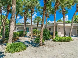 Image of Casey Key Oasis 3BR home on .75 acre w heated pool, boat dock, beach access