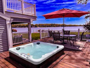 Image of PONTOON BOAT NOW INCLUDED! 7 BEDS, HOT TUB Updated Lakefront Cottage - Book Now
