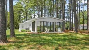 Image of The Porter's Barn - fancy little waterfront home with deep-water boat dock and firepit