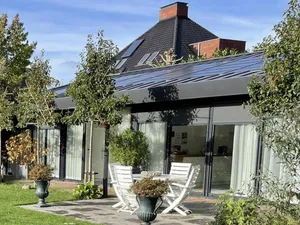 Image of Luxury house and large garden in a wooded area