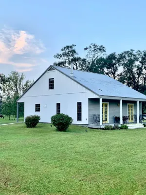 Image of Acadian Style home with a touch of modern farm house