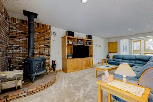 Image of Cozy Condo with Shared Pool, High-Speed WiFi, W\/D, Partial AC, & Wood Stove
