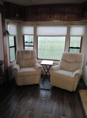 Image of Delightful 5th wheel w\/ queen bed, patio deck, and high speed internet.