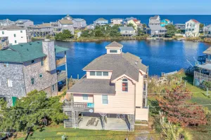 Image of Gorgeous lagoon-front home steps from the sound with private dock & central AC