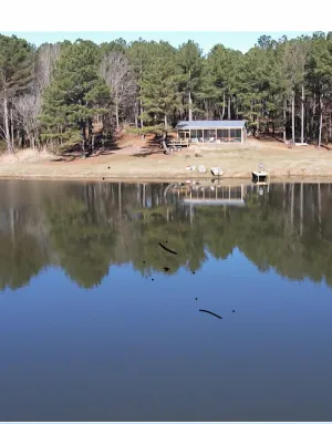 Image of Newly Built Cabin with a 2.5 acre Lake on 120 Acres of Private Land