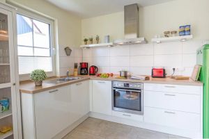 Image of Holiday Home 'Seemannsgarn' with Garden, Shared Sauna & Wi-Fi