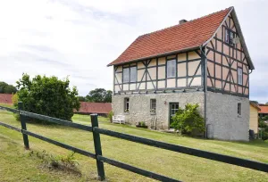 Image of half-timbered house from the 18 century, with view on the Wartburg