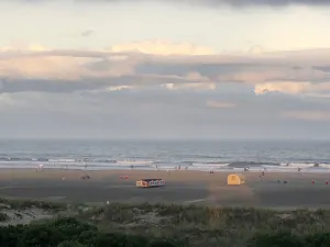 Image of Beautiful oceanfront condo complete with morning sunrise