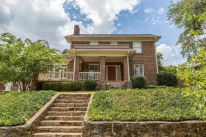 Image of Historic Beauty: 5BR Home with Yard Near Hospital