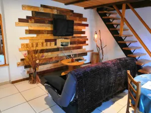 Image of Cozy 2-Bed Rental with Mountain Views, Private Terrace, and Nearby Waterfalls