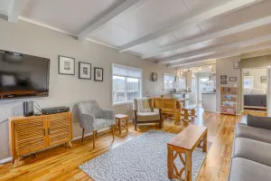 Image of Inviting waterfront cottage w\/deck featuring a BBQ, kayaks, and canal access