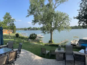 Image of Beautiful Lakehouse sleeps 12. Boat,fish kayaks, hot tub, pets. Wilmot ski,tube