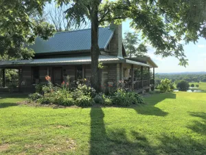 Image of Historic Log Cabin on 200 acre farm, pasture and forest with panoramic views!