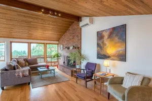 Image of Tabor Hillside Retreat over the trees, walk to trails, and Montavilla cafes.