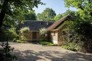 Image of A luxury group accommodation in which you can spend a nice time with your family or group of friends. This large robust house accommodates everyone, has a spacious living room, and has 8 bedrooms and 4 bathrooms.