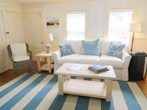 Image of This lovely condo location in town, has both a brick patio and deck for you to enjoy your morning coffee on!