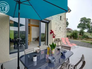 Image of Spacious house with terrace, garden, and wood stove in Saint-Héand