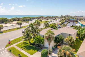 Image of Coconut Cabana - Duplex Delight, Beach-Themed 6BR Retreat with 2 Outdoor Patios & GRILL, Steps from the Sand!