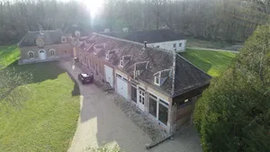 Image of Chateau outbuildings next to a golf course in the Gâtinais en Brie region