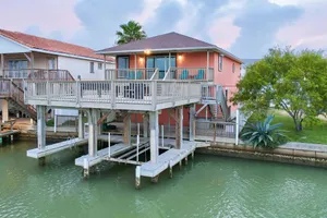 Image of Lovely Waterfront Home w\/ Two Kitchens, Free WiFi, & a Furnished Deck