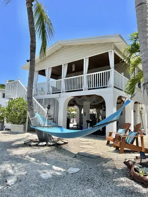 Image of Canal Home with Direct Ocean Access, 75' dock, Hammock,  Coconut Trees & More🌴