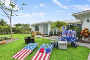 Image of Updated Stuart home in waterfront community with private backyard, pool & lanai