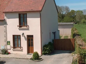 Image of Charming Cottage with Shared Pool, Garden, and Modern Amenities in Tranquil Village Setting