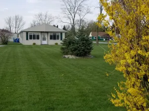Image of Open concept 2 bedroom ranch with attached garage and deck