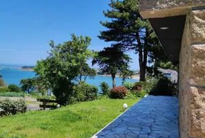 Image of Maison Bord de Mer, Dans un Écrin de Verdure